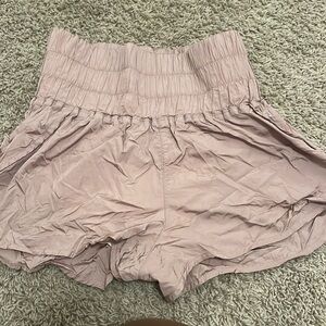 free people movement shorts in a mauve pinkish color